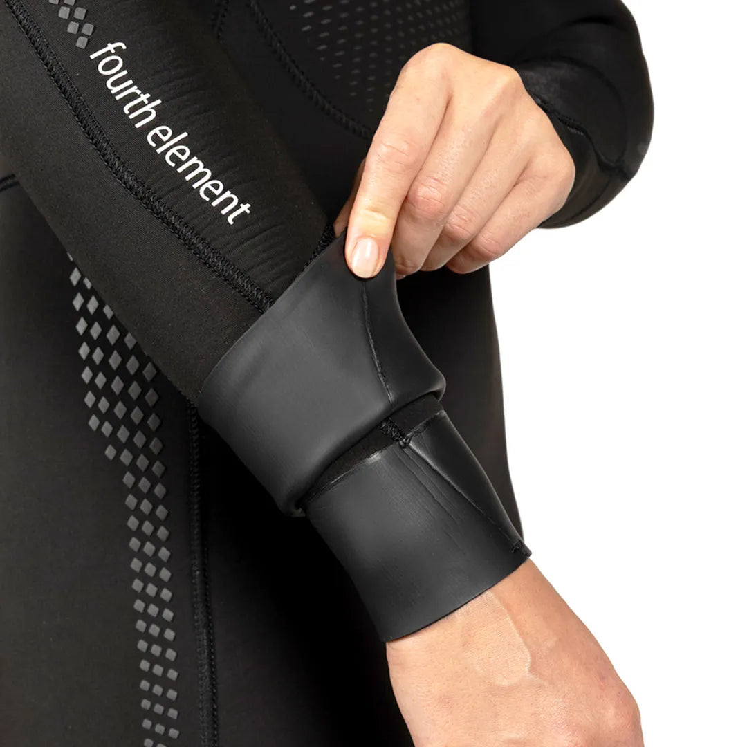 Close-up of a person wearing a Fourth Element Xenos ARC Wetsuit.