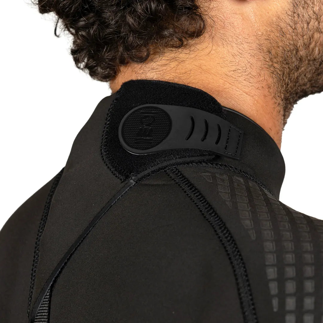 Close-up of a person wearing Fourth Element Xenos ARC Wetsuit.