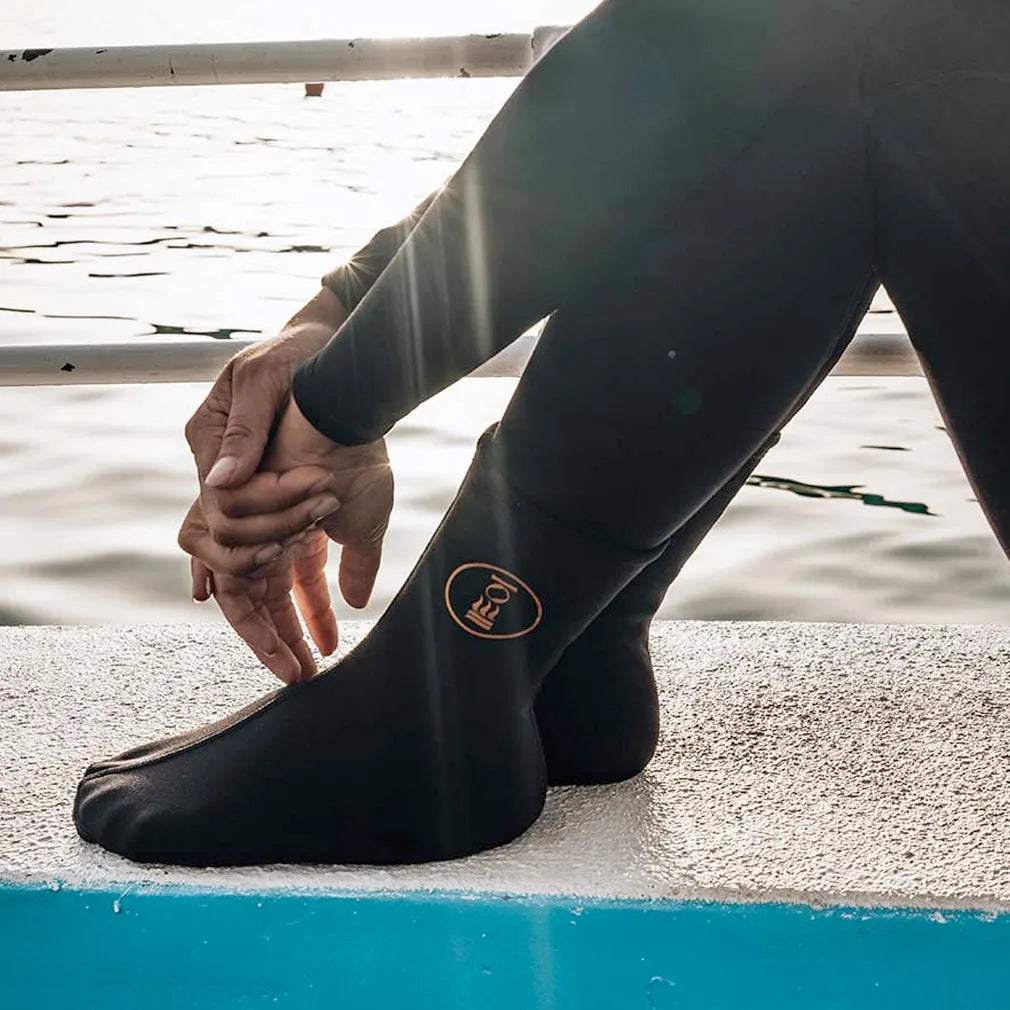 Diver wearing Fourth Element Xerotherm Socks