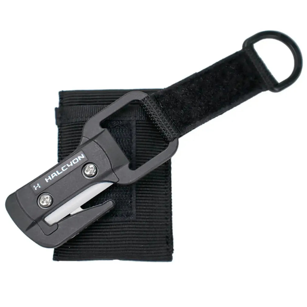 Black Halcyon line Cutter with sheath on a white background