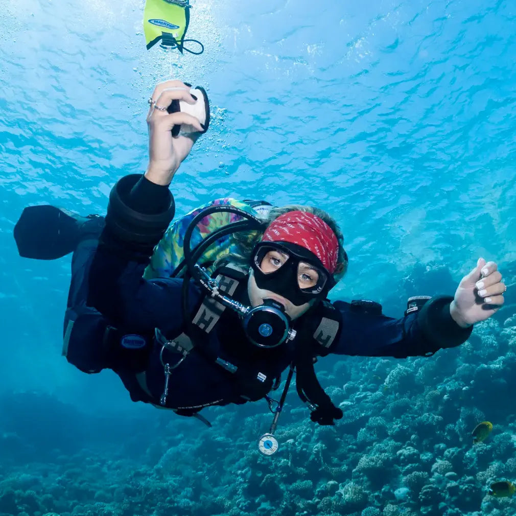 Scuba diver wearing Halcyon Low Profile Mask underwater.