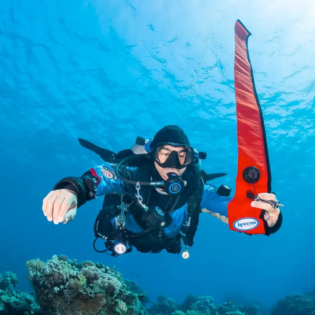 Diver underwater with Halcyon Super Big 6' SMB