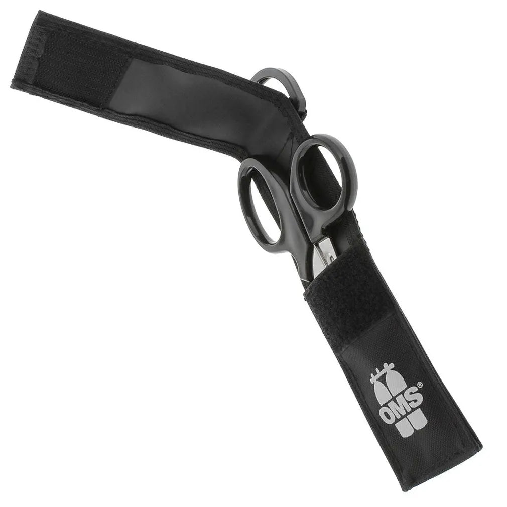 Black shears with a strap on a white background, featuring the OMS logo.