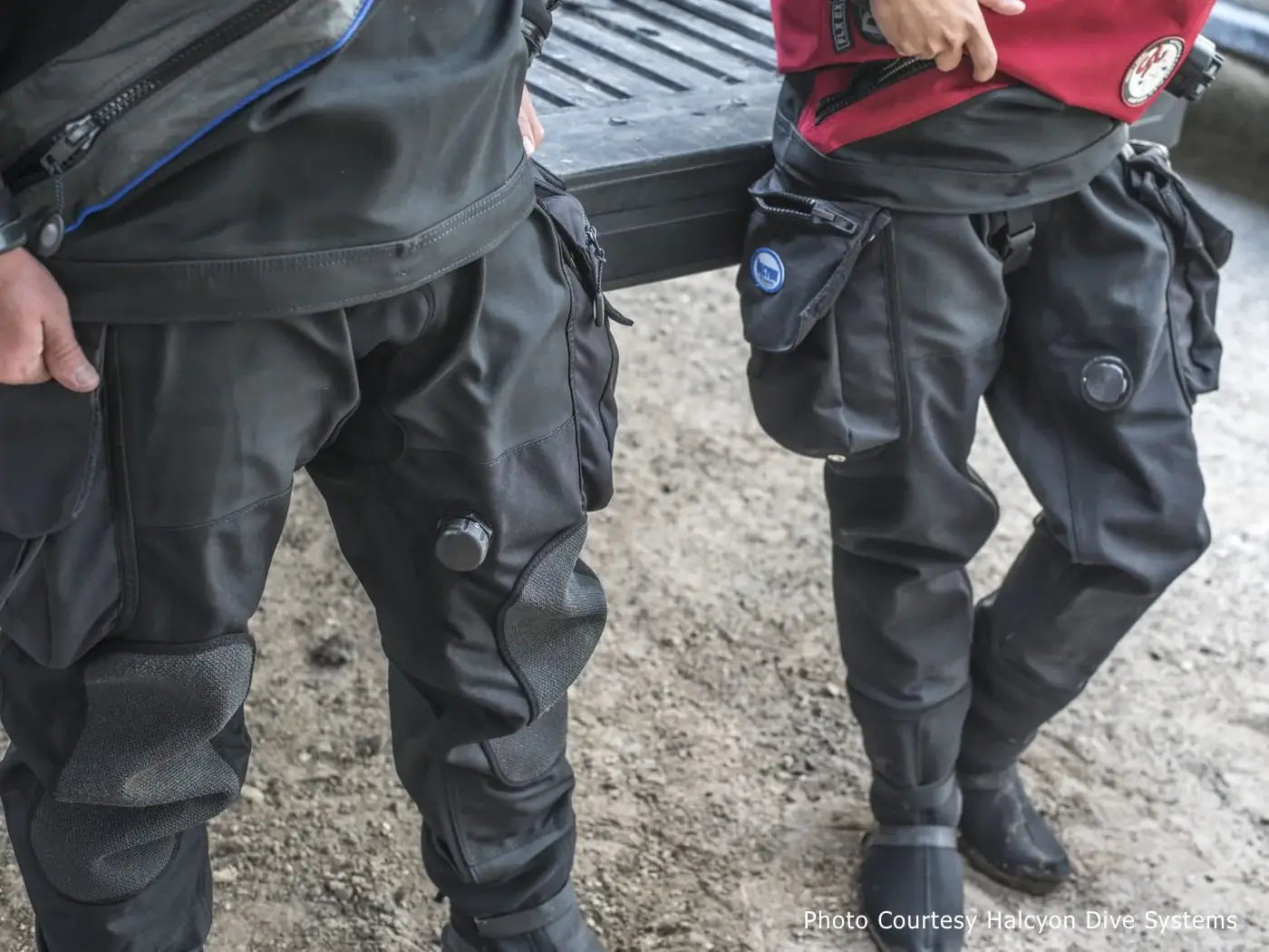 Drysuit divers walking with P-valves on legs