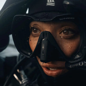 Person wearing a Fourth Element Seeker Mask.