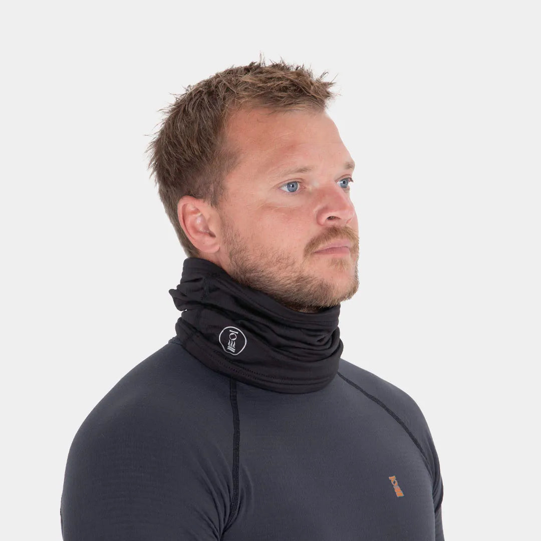 Man wearing a black Fourth Element J2 Neck Snug