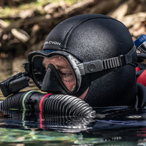 Person in scuba diving gear wearing Halcyon Hood
