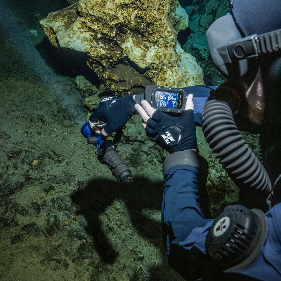 Diver underwater with Halcyon Symbios