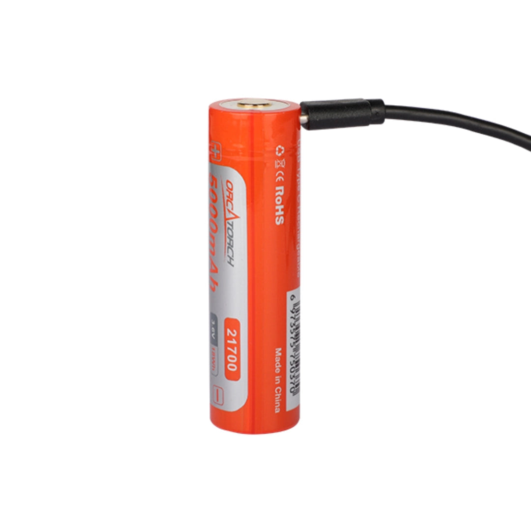 Orcatorch 21700 battery upright with charge cable