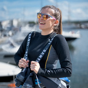 Female diver wearing Santi E.Motion+ Drysuit